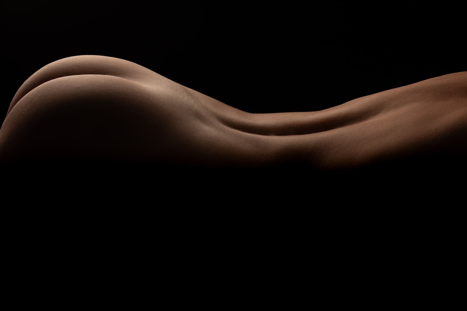 Photo de nu artistique féminin en clair obscur